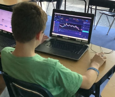 Checking on his stocks